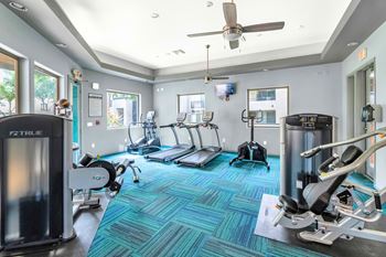 Fitness center with cardio equipment and weights